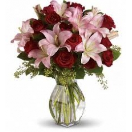Pink Lilies And Red Roses In Glass Vase